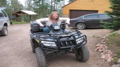 woman riding an ATV